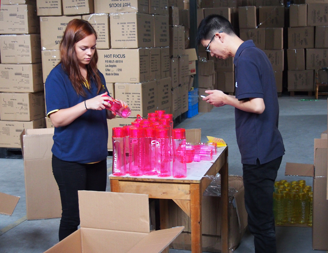 inspecting water bottles