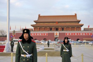 military-guards-stand-guard-in-front-of-the-forbidden-city-of-beijing-china-1600x1064